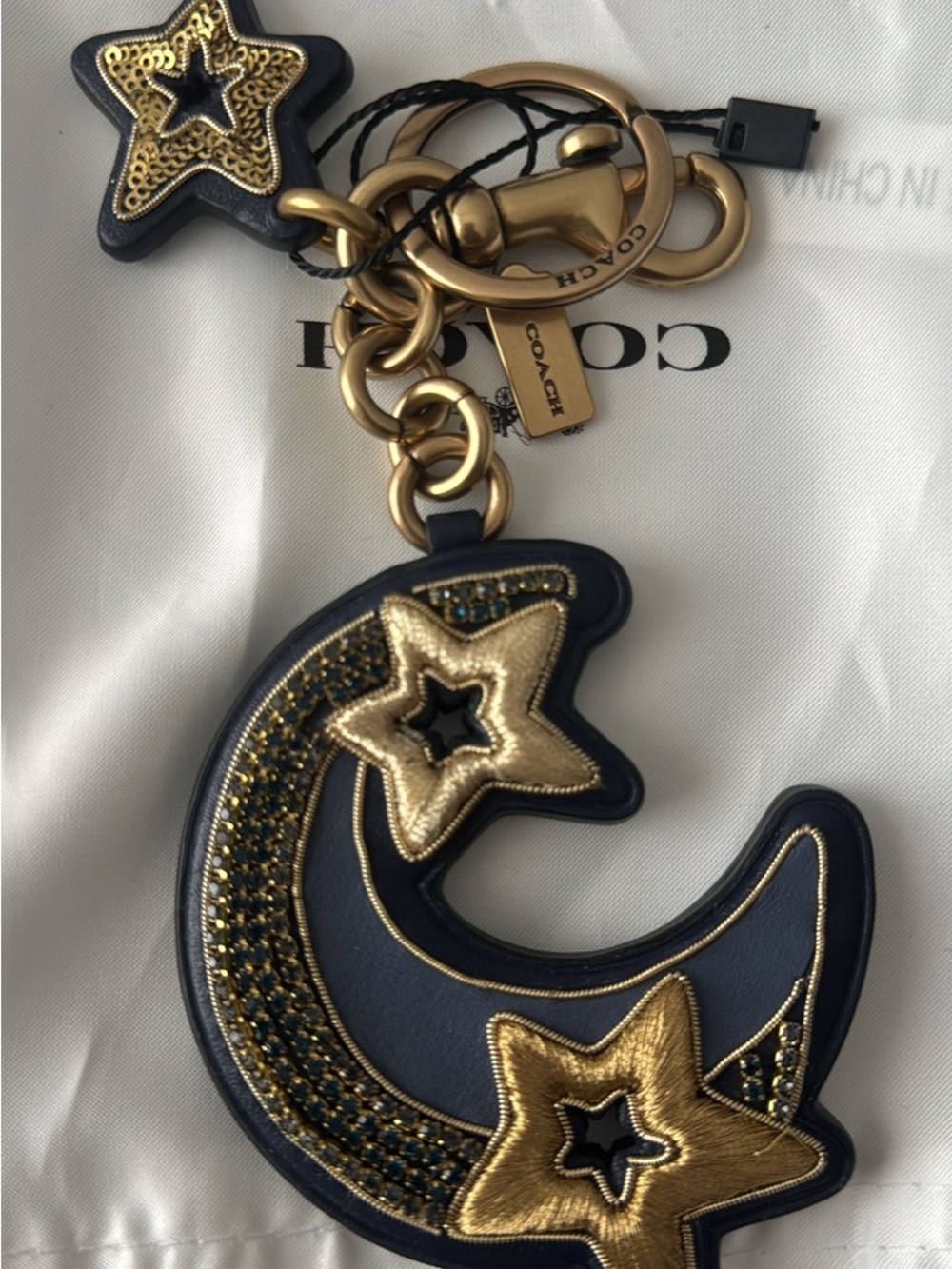 Coach Navy and Gold Star & Moon Charm Keyring